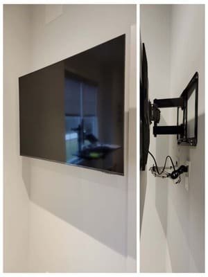 Flat screen TV mounted on a wall with the bracket shown